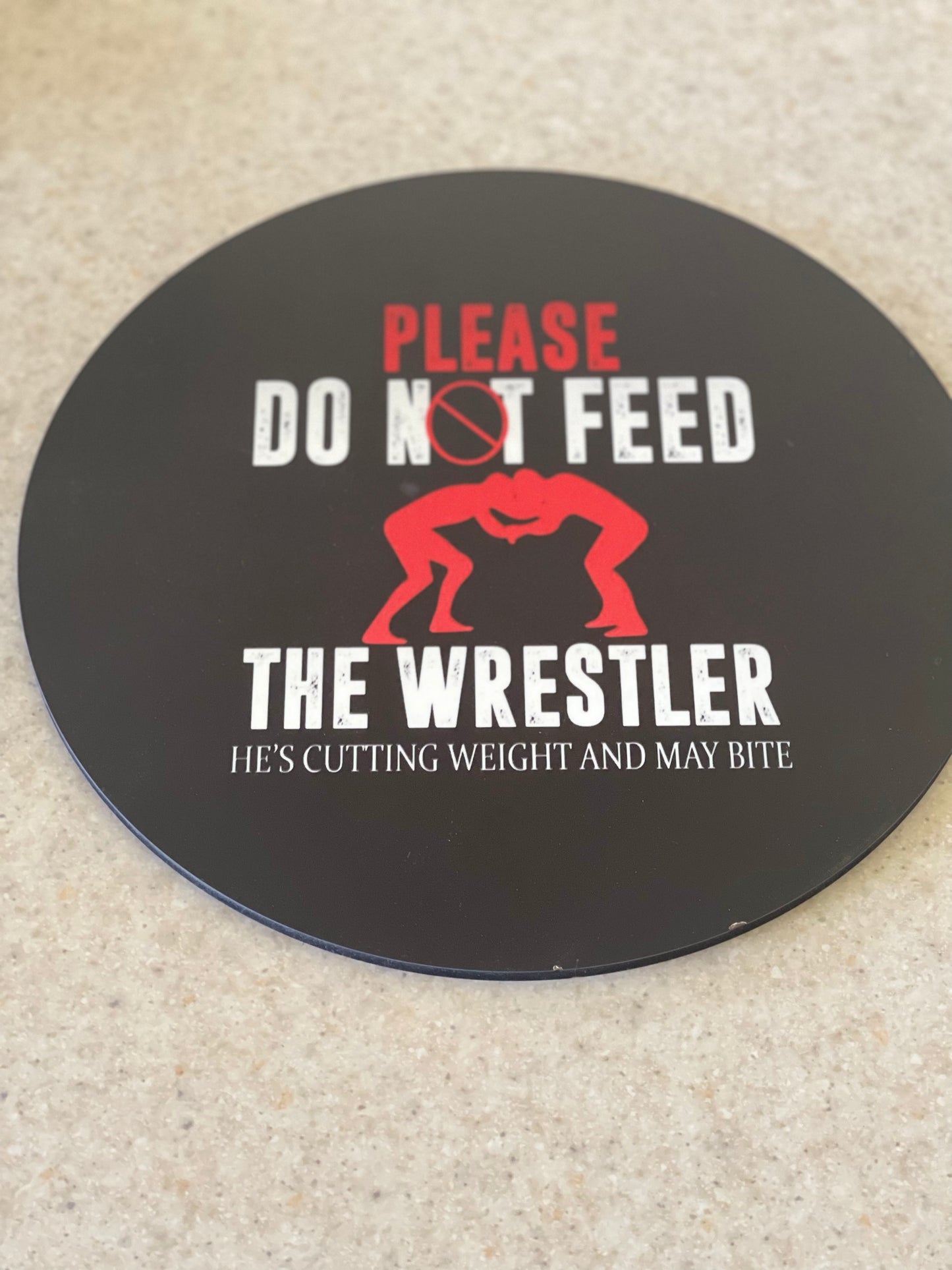 Please Do not feed the Wrestler - Round Sign
